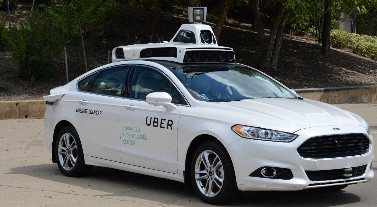 Uber pushes for self-driving cars after losing $900 million