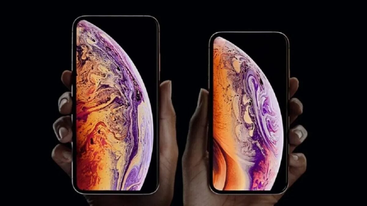 Why did Apple eliminate the home button and which was the first terminal?