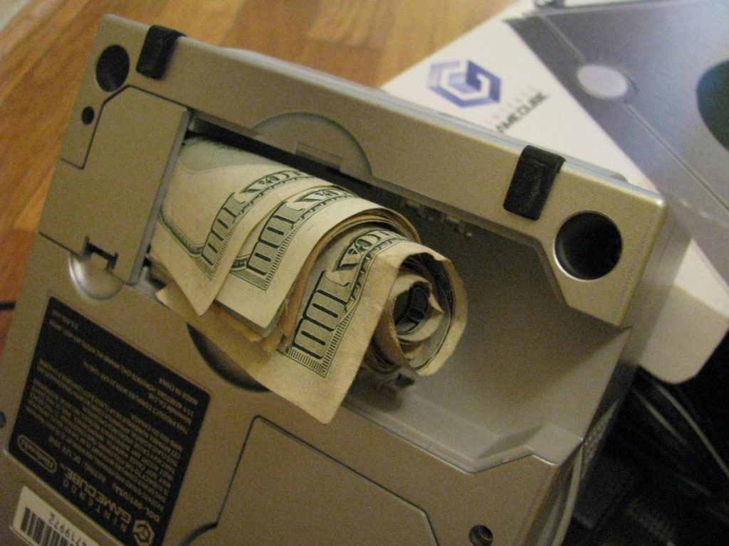 Check out these Unbelievable Tech Related Yard Sale Finds! GameCube stuffed with cash