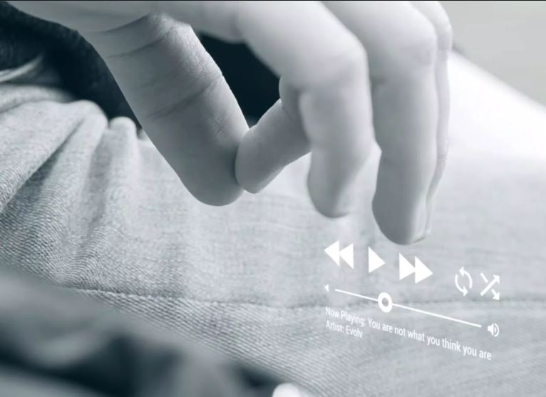 Adjust the volume by miming it.