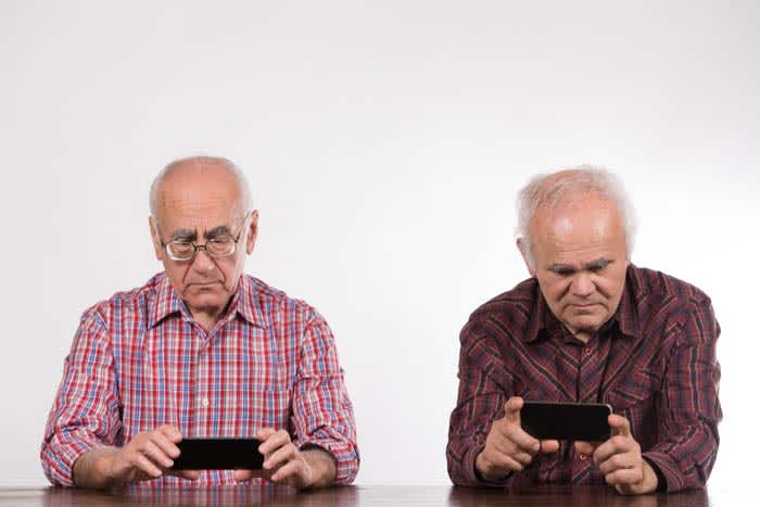 Old people using a phone
