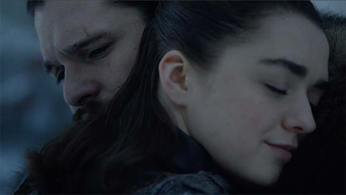 Arya and Jon hug