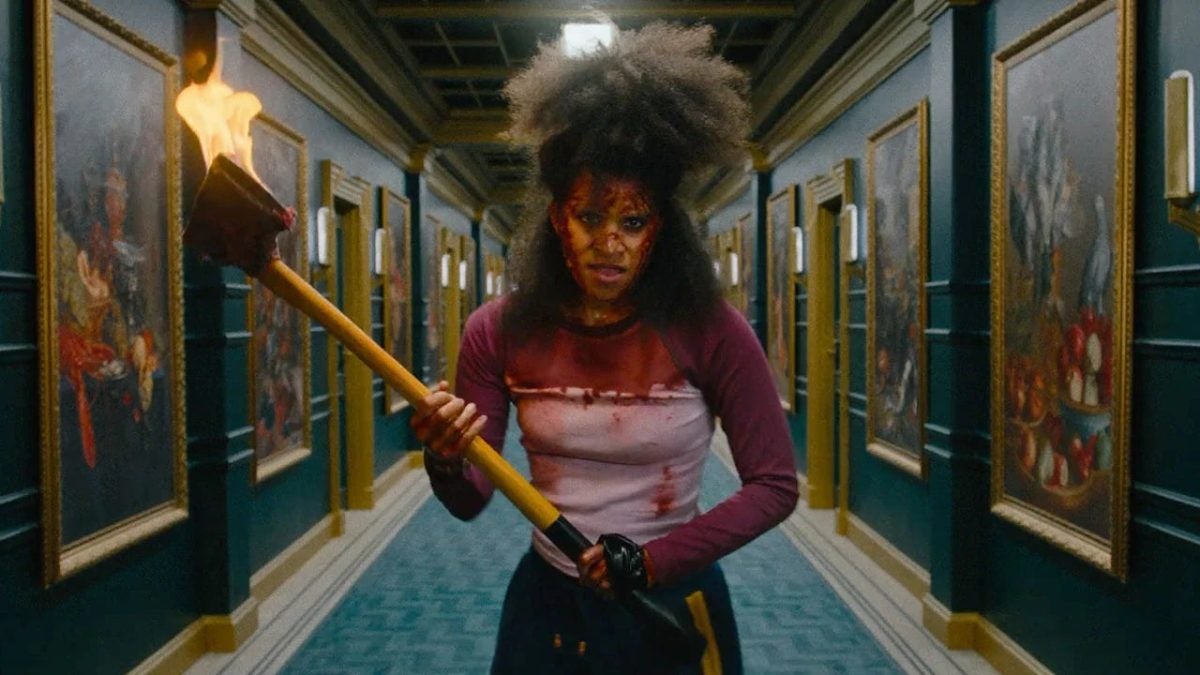 The director of It presents his new action and horror movie with one of the lead actresses from Deadpool 2