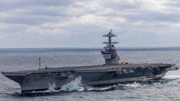 USS John F. Kennedy passe…