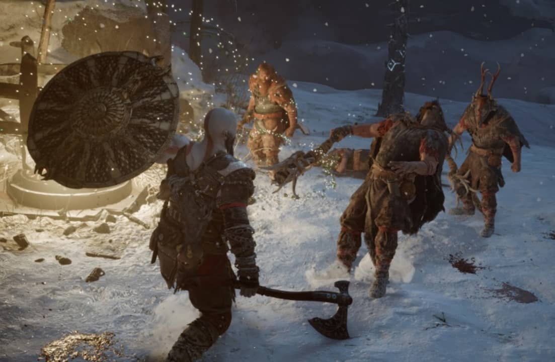 Kratos bloqueando a un enemigo